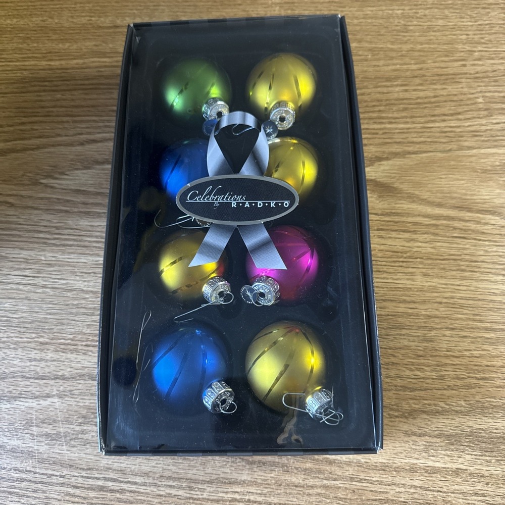 RADKO EIGHT CHRISTMAS CELEBRATION BALLS ORNAMENT FROM 2010